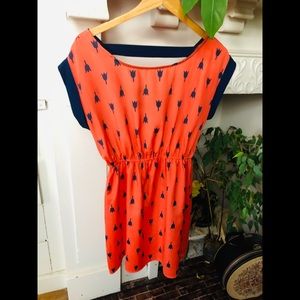Orange dress tunic with navy blue tulips.